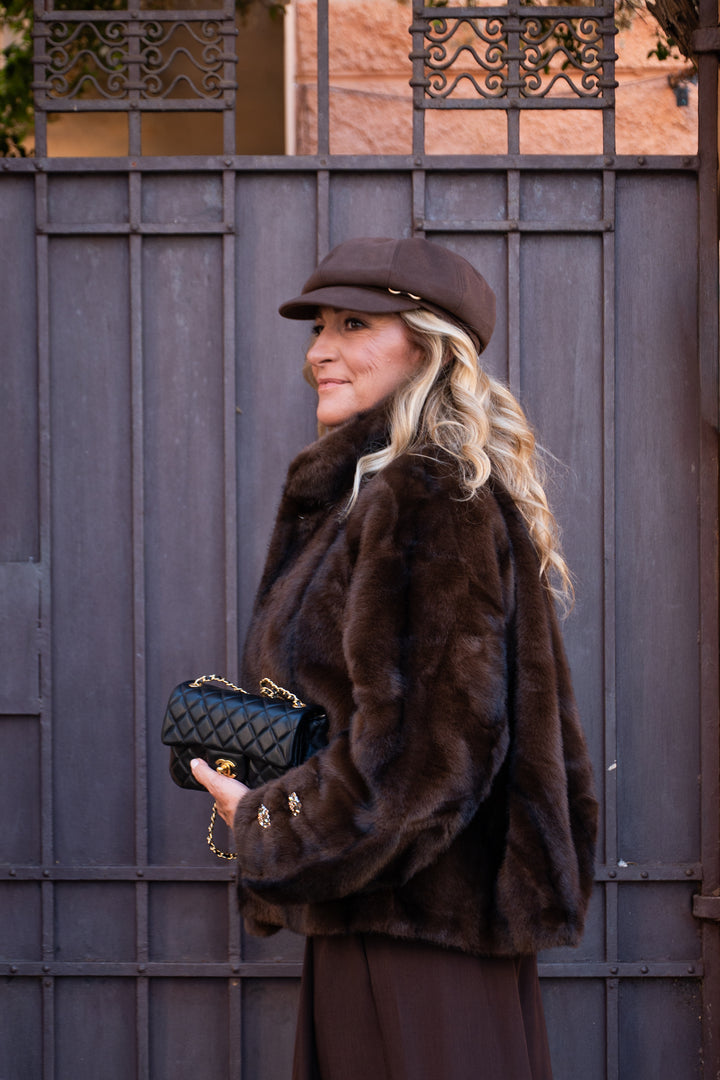 Pelliccia bottoni gioiello