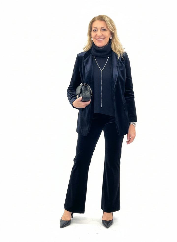 Pantaloni zampa velluto liscio