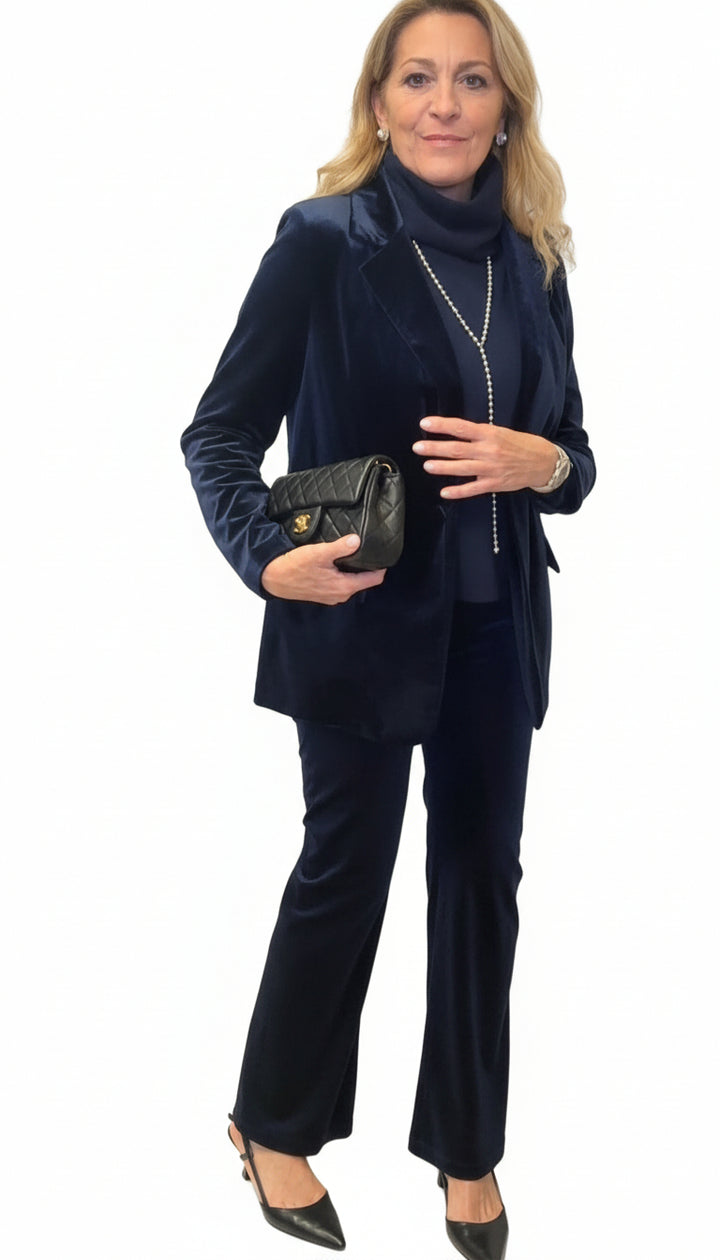 Pantaloni zampa velluto liscio