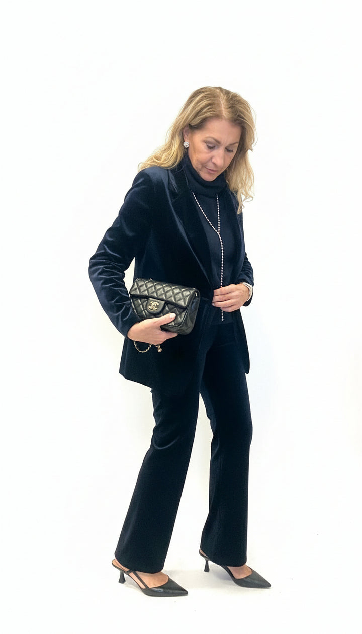 Pantaloni zampa velluto liscio