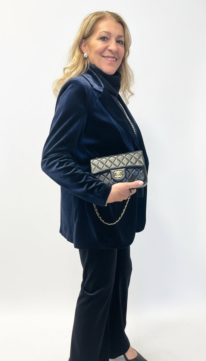 Pantaloni zampa velluto liscio