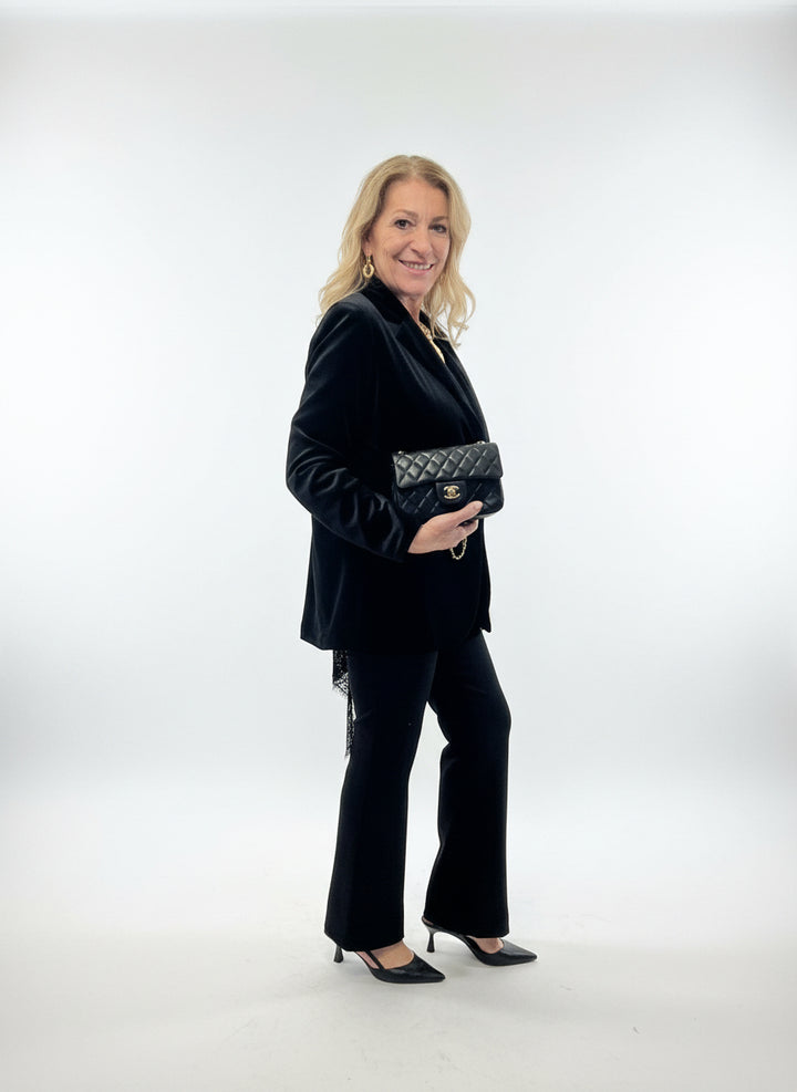 Pantaloni zampa velluto liscio