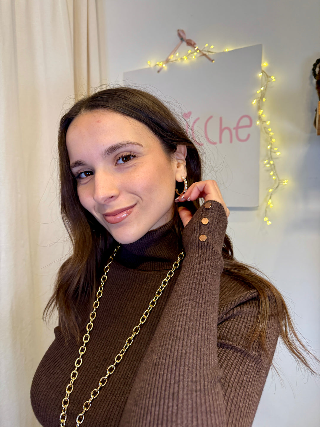 Maglione collo alto bottoncini