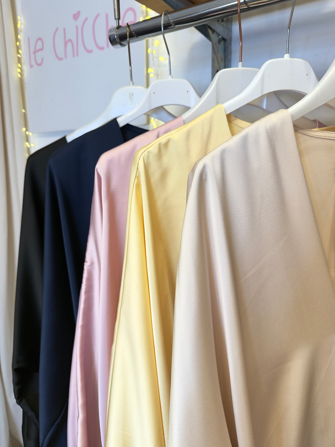 Blusa over in raso a V